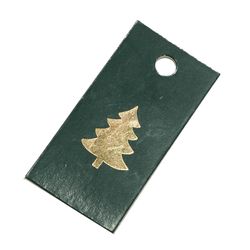 Green gift label with a gold Christmas tree