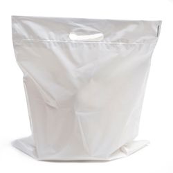 A ‘Plastic Bag Recycling M’ sign is on a table